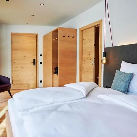 Hotel Wellness Und Brunch Morgenzeit Beheizter Naturpool Mit Sandstrand Genuss Fruehstueck Bis 13 Uhr Hochkoenig Sommercard Maria Alm am Steinernen Meer